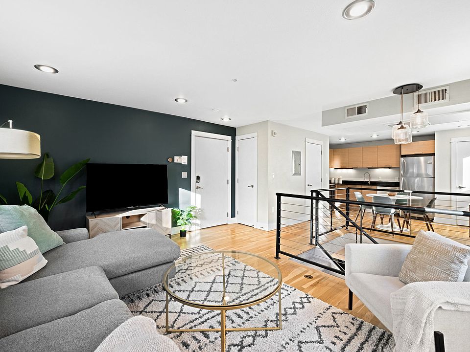 Main floor with open concept living and a fully equipped kitchen