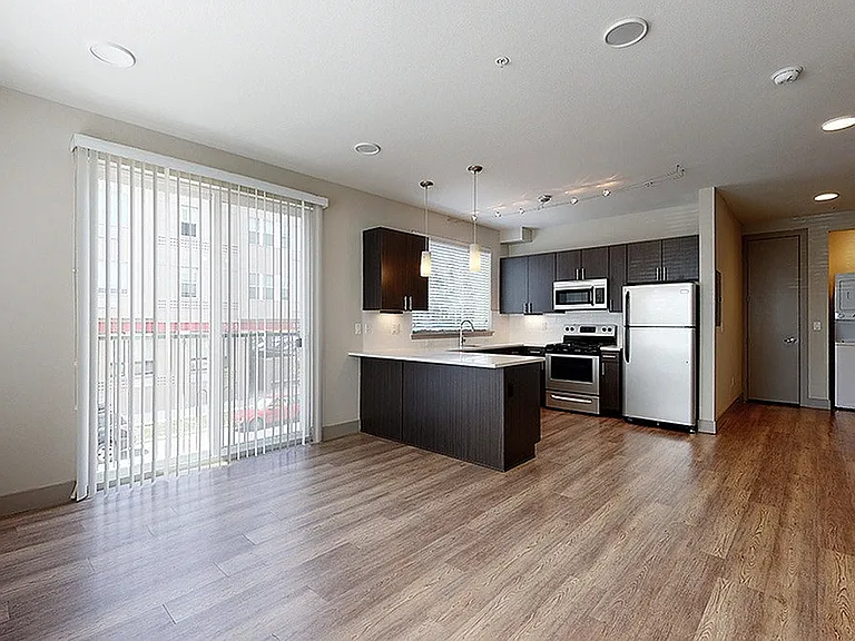 ba_xatsloans_unit1-218_620sf_living1_1200x675