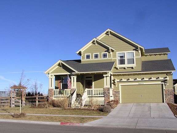 South Facing Home with Covered front porch, Trex decking and 3-car garage.