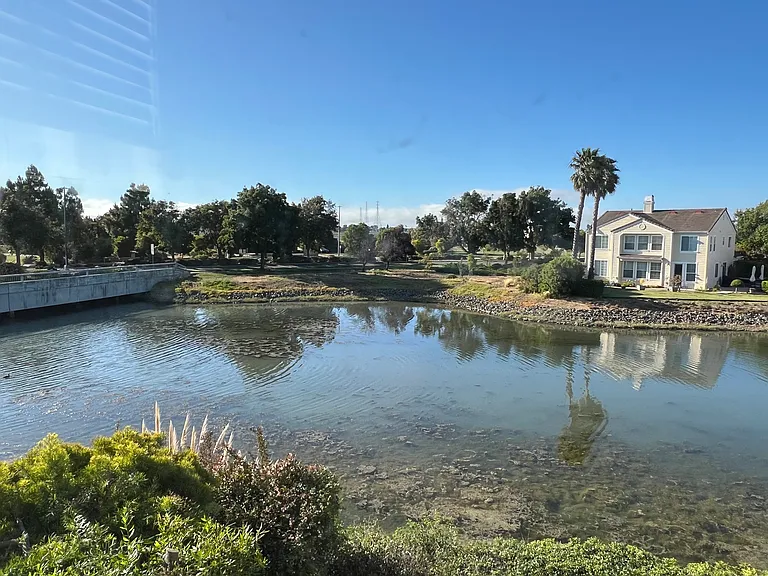 Panoramic waterfront window view from Master Bedroom