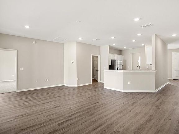 Enjoy a sunny layout with an open gathering room and kitchen - Savannah by Highland Homes