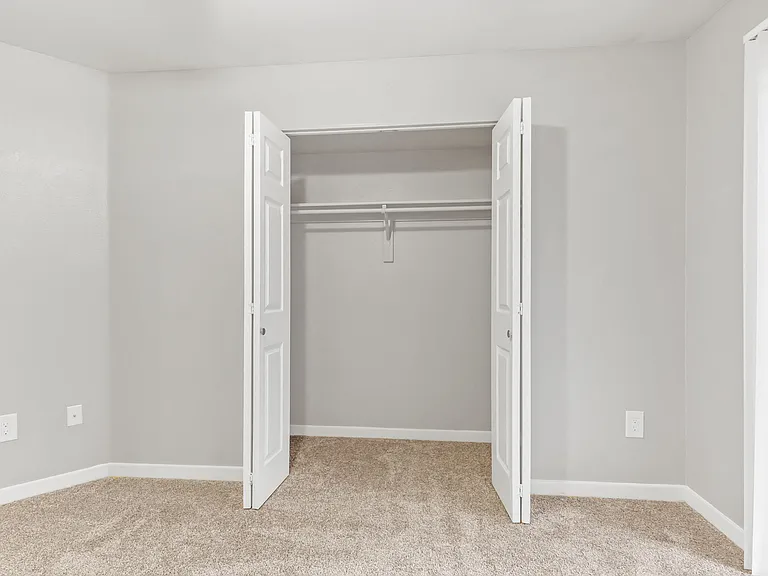 A Closet at The Buttes Apartment Homes in Loveland, CO