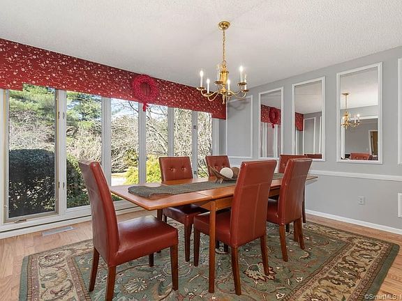 Spacious dining room - light, bright, freshly painted with new hardwood flooring!
