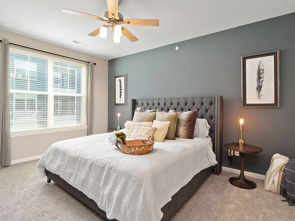 Spacious bedroom with ceiling fan