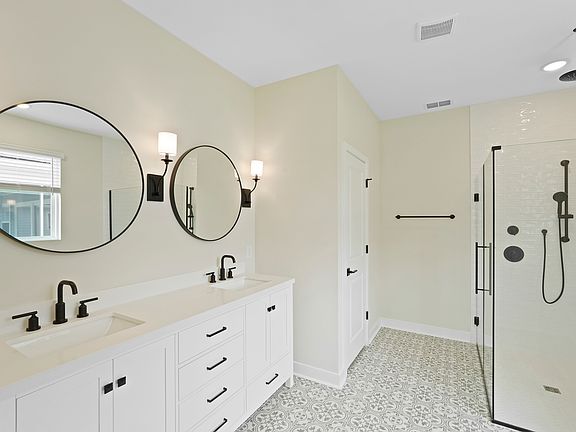 Primary bath with matte black finishes