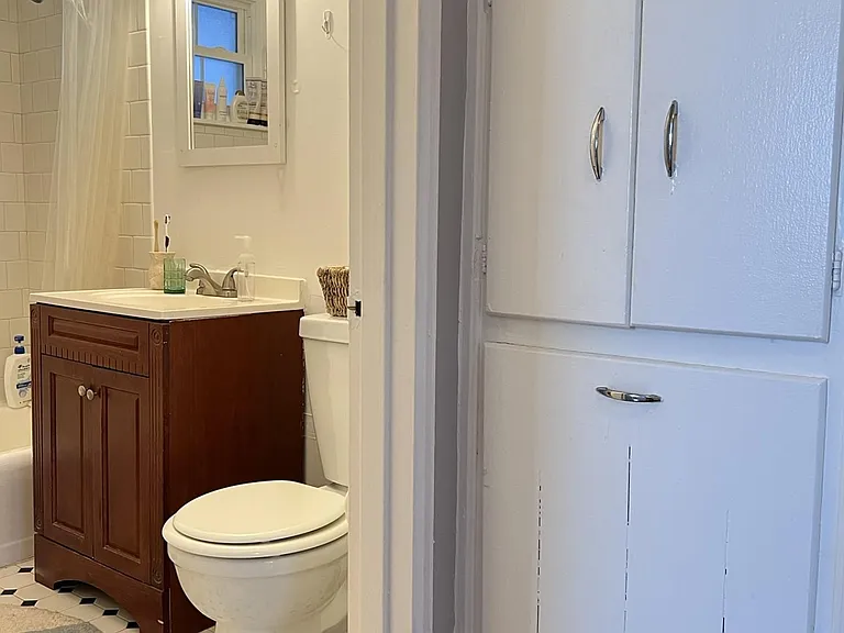 Built-in storage and hamper