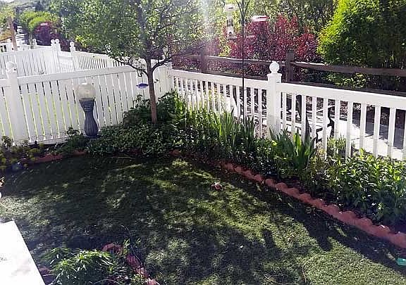 Beautiful yard and mature garden that pretty much takes care