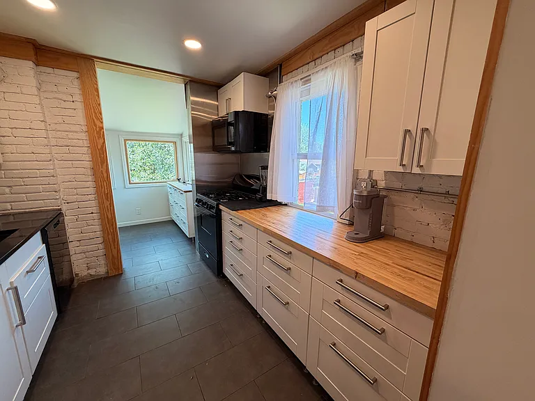 Pass thru kitchen to bonus sun roof or office