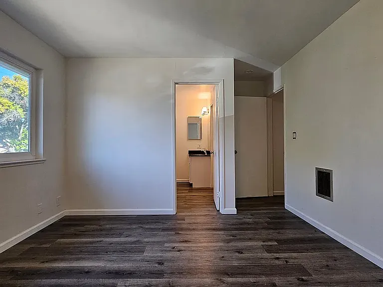 Master Bedroom with a private vanity sink ( part of Jack and Jill Bath room)