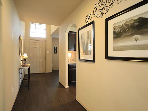 ENTRY & FRONT HALLWAY - Updated vinyl plank flooring installed 2019. Light neutral paint throughout home.