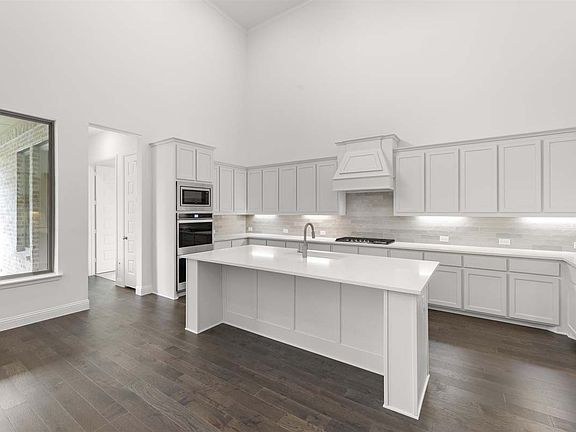 Fawncrest II floor plan by Pacesetter Homes features formal dining, private study, open living space