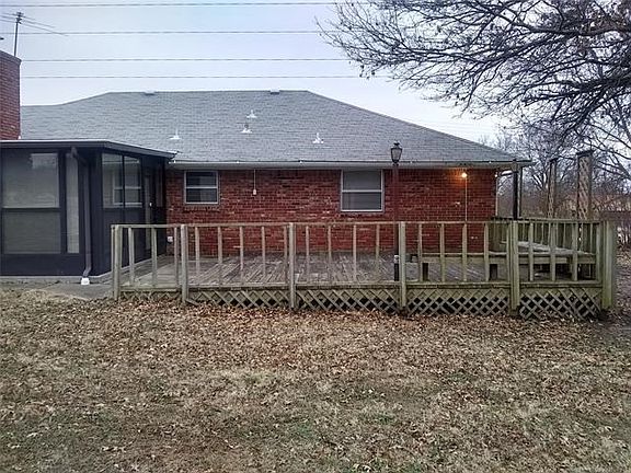 Rear Deck with door into Florida Room to left.