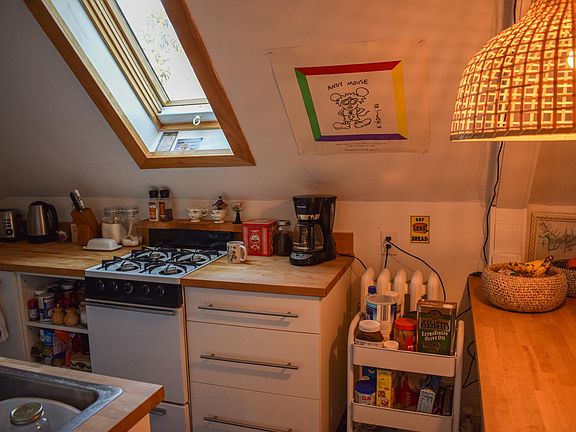 Kitchen with gas stove and deep Ikea cabinets/drawers