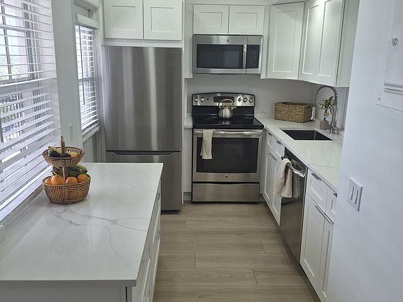 2nd image of 3050 N Palm Aire Dr APT 702