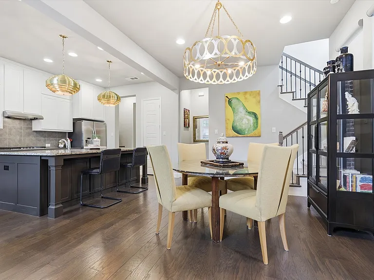 Open-concept dining space seamlessly transitions from casual everyday meals to upscale entertaining