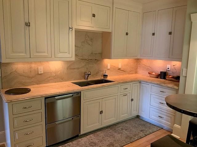Custom cabinets, high end counters/tile and all stainless steel appliances