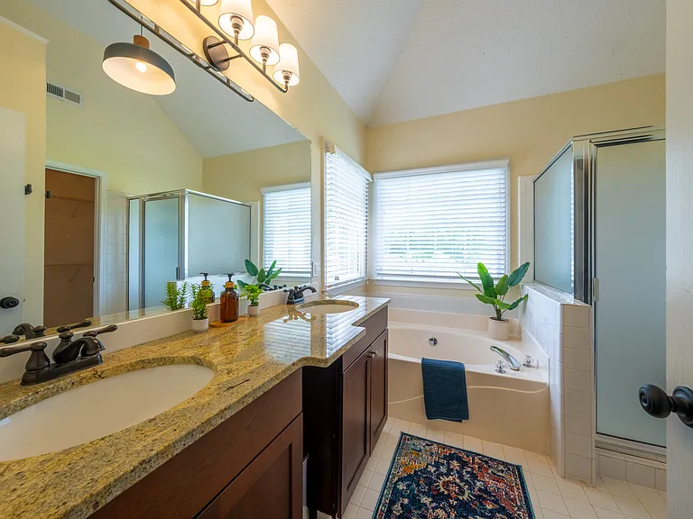 Primary Bathroom with Jacuzzi Tub and shower