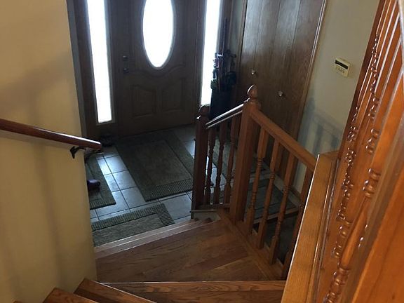 Spacious kitchen with generous cabinet space and bonus pantry, bright with kitchen window. Great upgraded bronze lighting throughout.