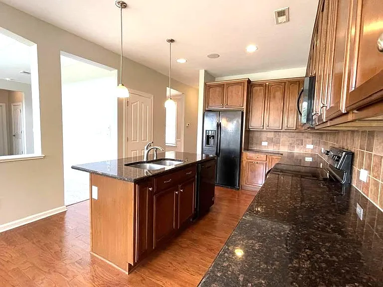10345 Falling Leaf Dr NW — Photo 5