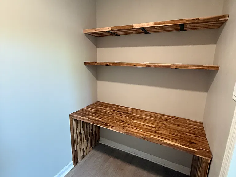 Office area/shelving near master bathroom