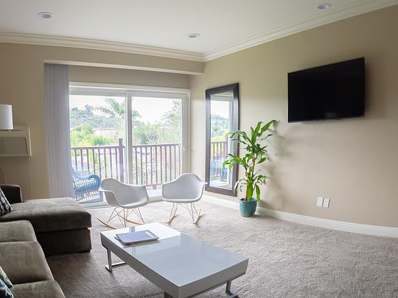 Smart TV with Apple TV - not pictured in table below TV that can be converted into dining table for four.