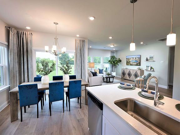 Prepare meals at the kitchen island while the kids hang out in the living room.