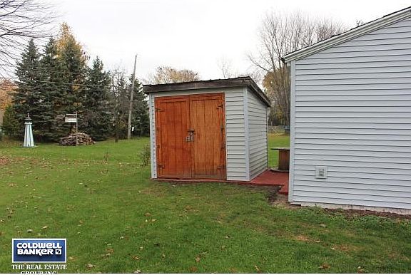 Shed behind garage