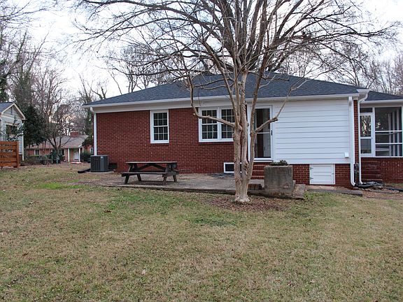 Back of house with patio