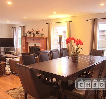 Marble top dining table with leather chairs for festive feas