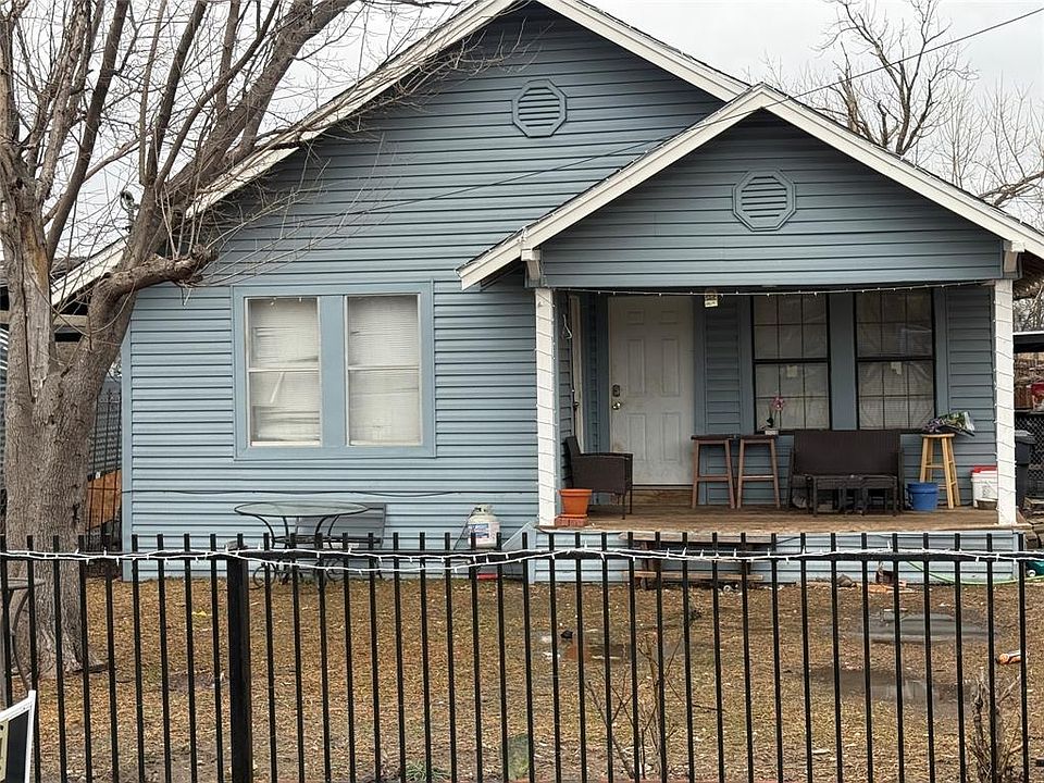 Bungalow-style house with a front lawn