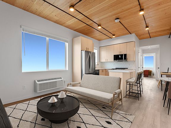 Experience contemporary comfort in this stylish open-plan living space.