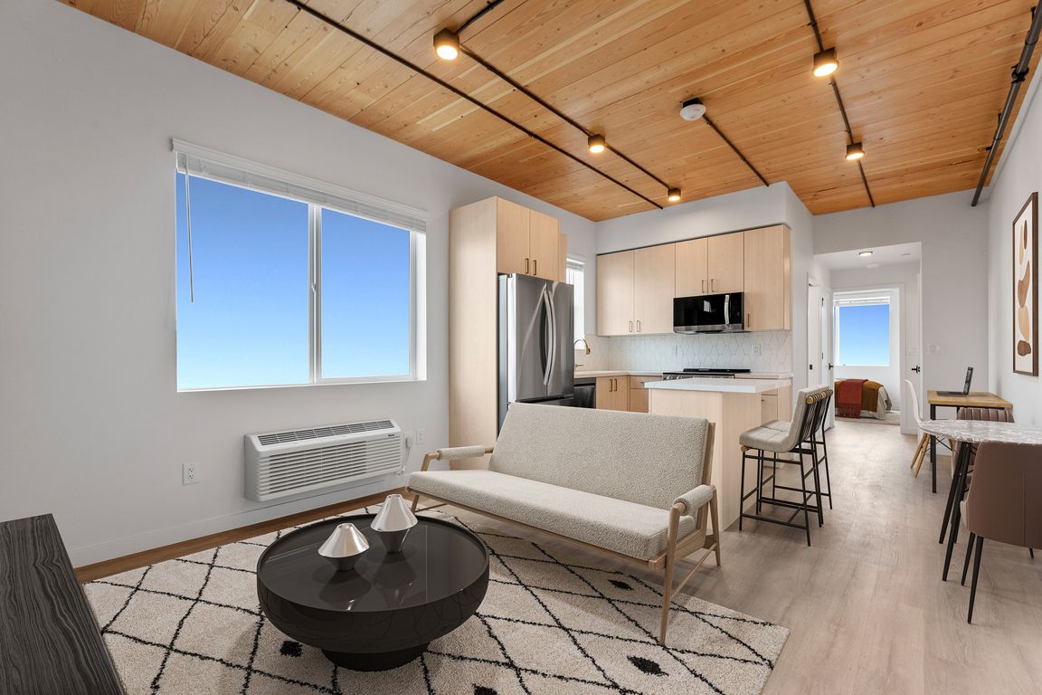 Experience contemporary comfort in this stylish open-plan living space.