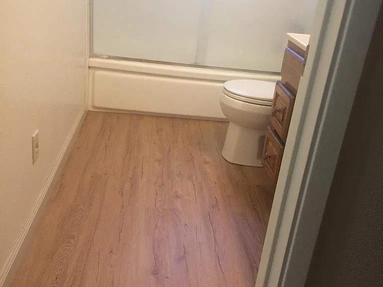 New vinyl laminate floor in bathroom