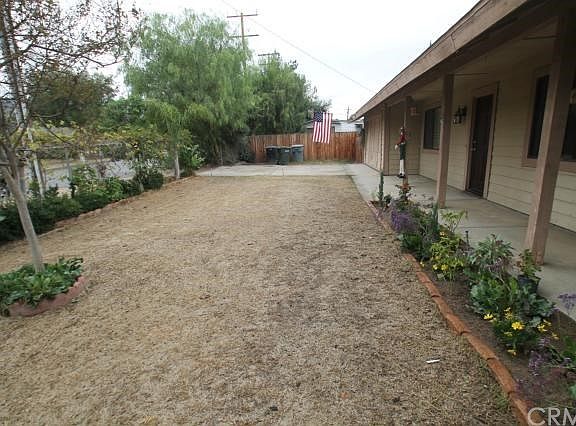 Fenced front lawn area.