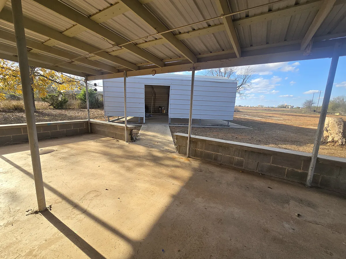 Attached carport and additional 3 car detached carport - 258 County Road 4000