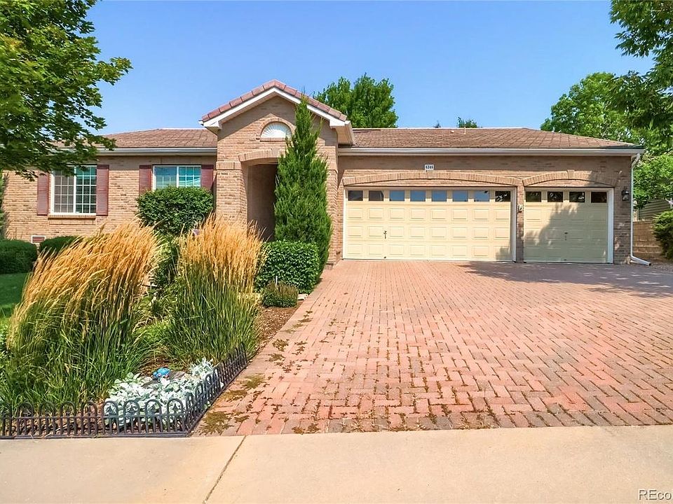 Paved drive way with 3-car garage.