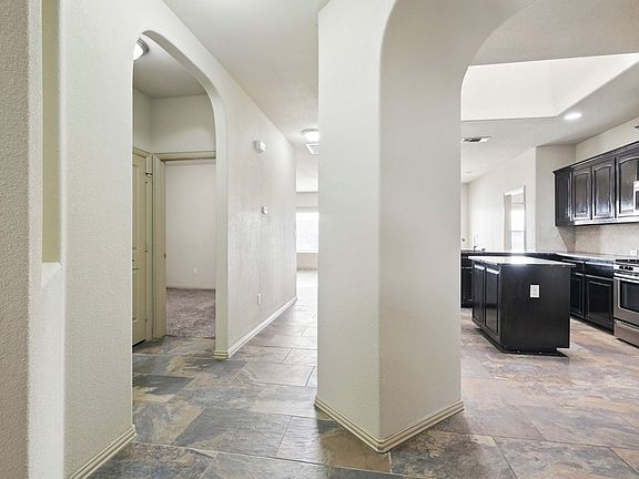 sweeping arches inviting you into the home!