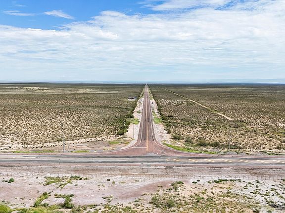 Looking North at the intersection of Ranch Rd 1437 and US Highway 62/180. Pending a survey, sellers may not own a small tract of this intersection on the West side corner