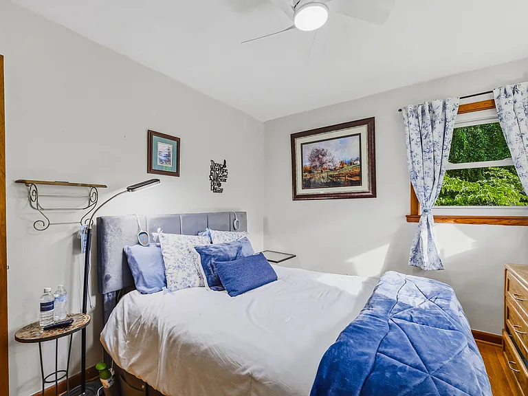 MAIN LEVEL: Front Bedroom (Hall to left, Closet behind camera)