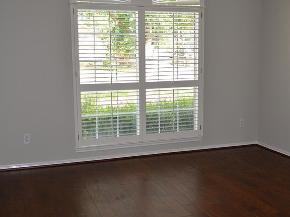 View 1 of the large private study located off the front entrance.
