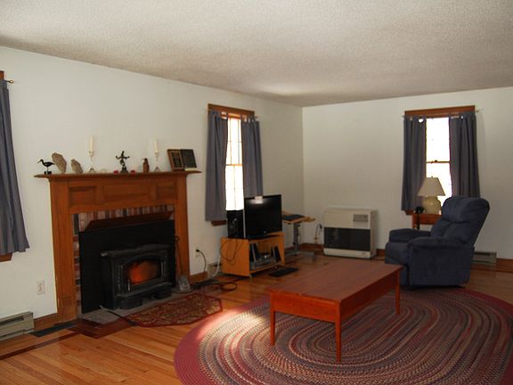 living room with lopi stove