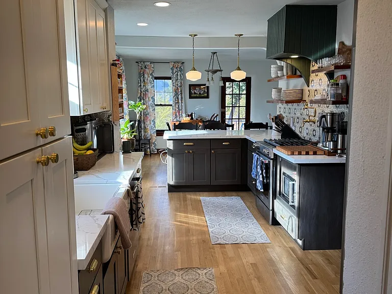 Large kitchen open to the living room, entry and garage