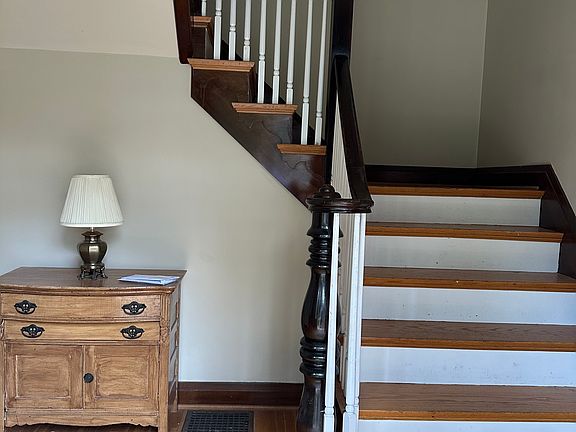 Front staircase in the foyer
