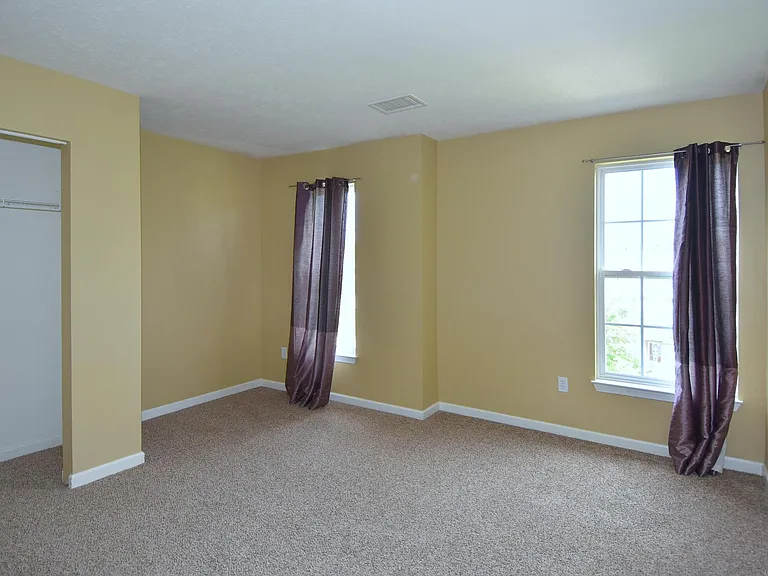 The second bedroom has a spacious attached closet