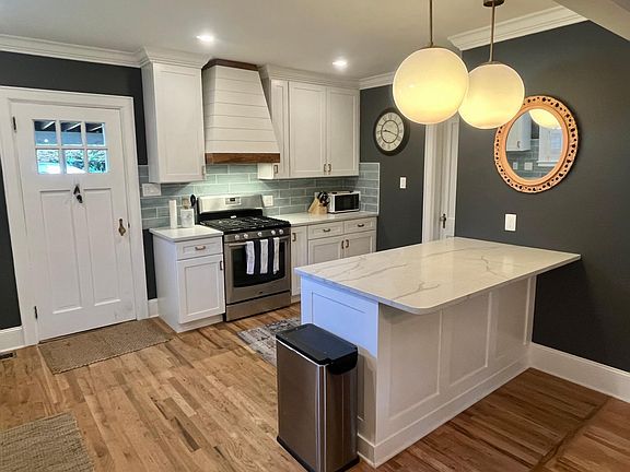 kitchen facing back door to mud room