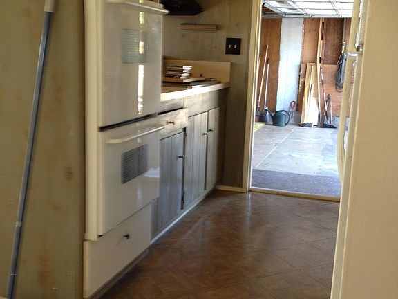 Kitchen looking into garage