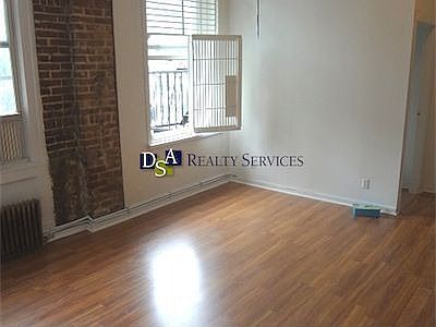 3rd image of 145 E 2nd St APT 1