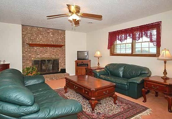 Comfortable family room with wood fireplace