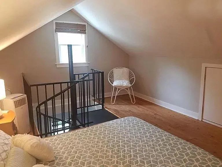 Up the spiral stair case there's a 3rd bedroom room