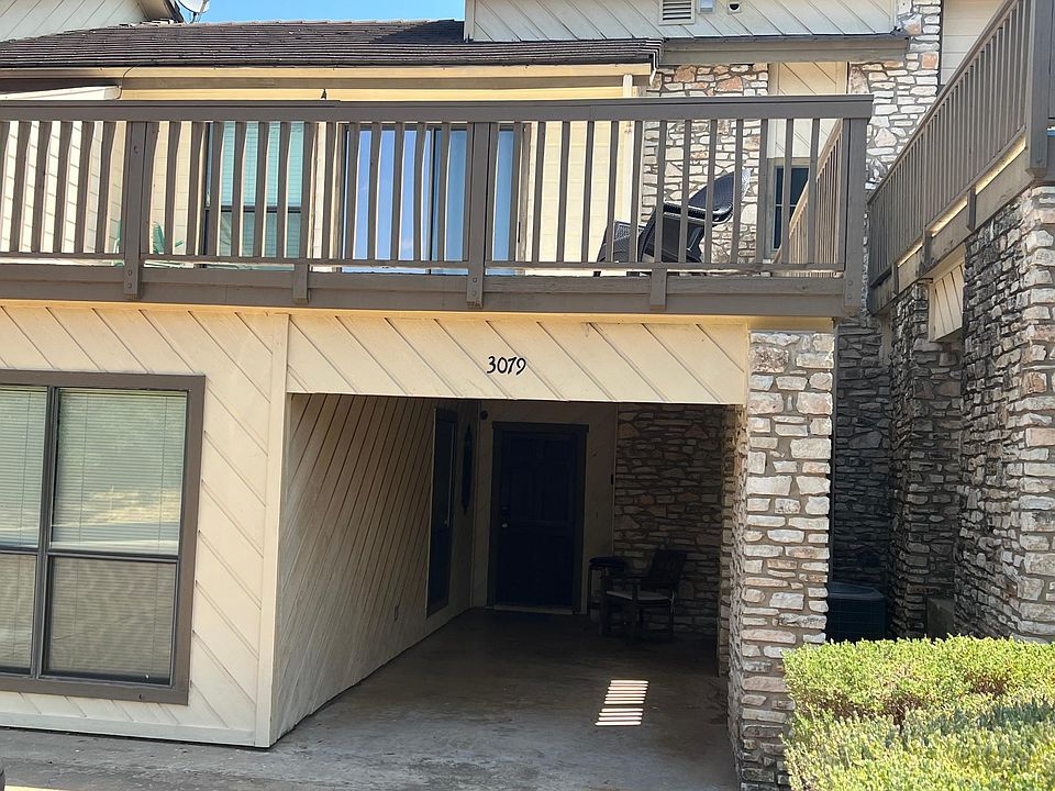 Carport with deck above off master br 1